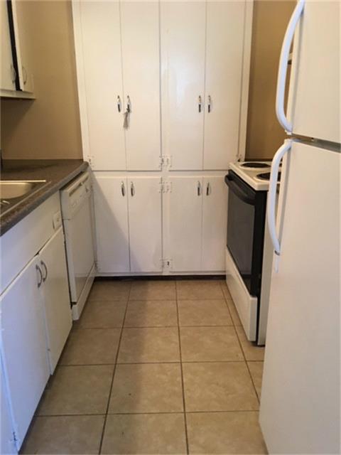 275 North 7th Street, Unit 5 Beaumont, TX 77702 - Photo 5 of 9 a view of a storage and utility room with closet