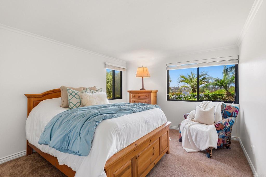 13319 Pacer Lane Poway, CA 92064 - Photo 42 of 75 a bedroom with a bed and a couch