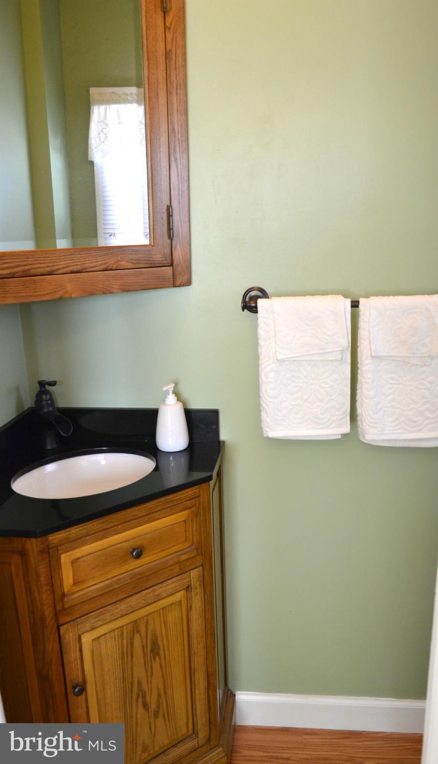 598 Riverside Drive Pasadena, MD 21122 - Photo 20 of 30 Half Bath