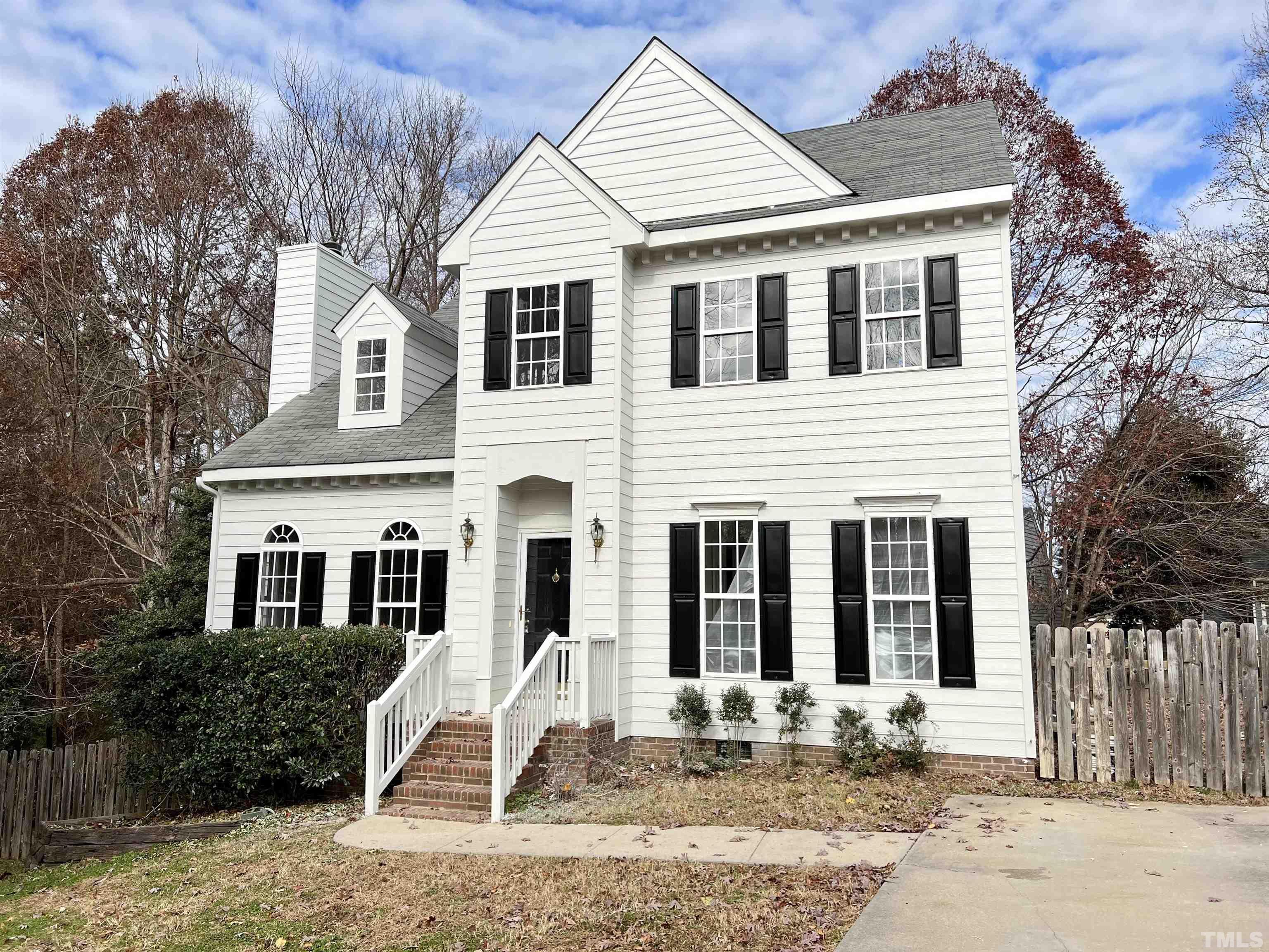 4108 Highbrook Trail Raleigh, NC 27616 - Photo 1 of 18 a front view of a house with a yard