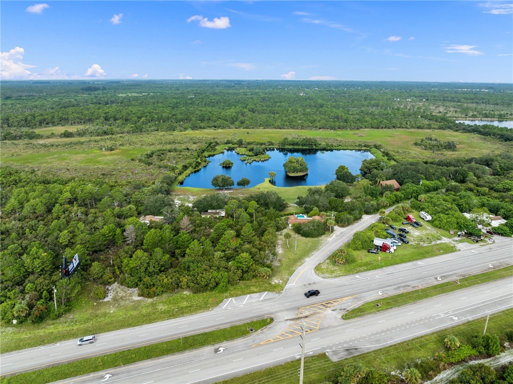 5051 Tozour Road Fort Pierce, FL 34946 - Photo 13 of 31 a view of a garden with an outdoor seating