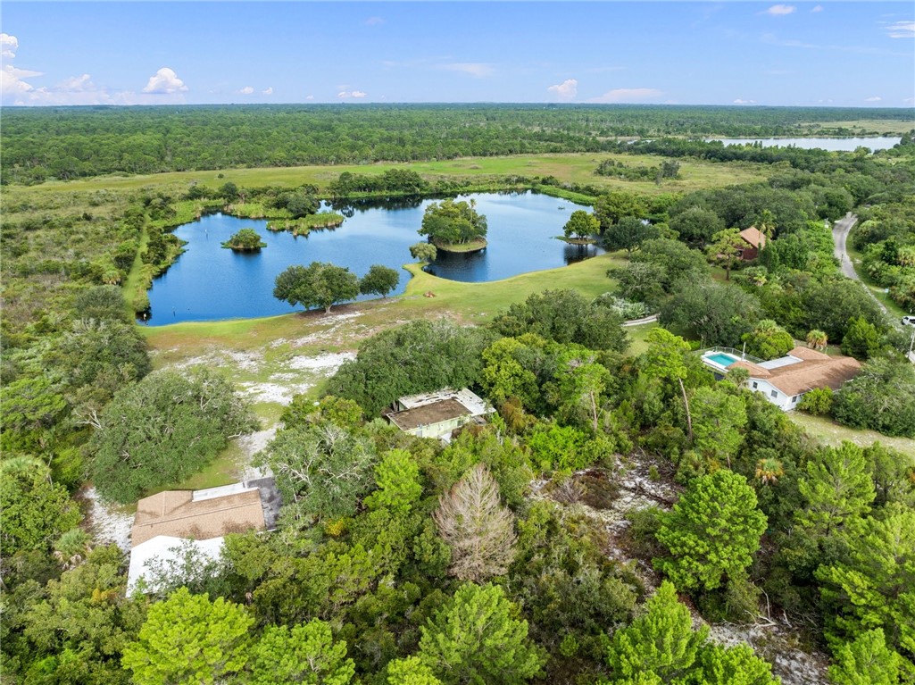 5051 Tozour Road Fort Pierce, FL 34946 - Photo 17 of 31 a view of a city and mountains in the background