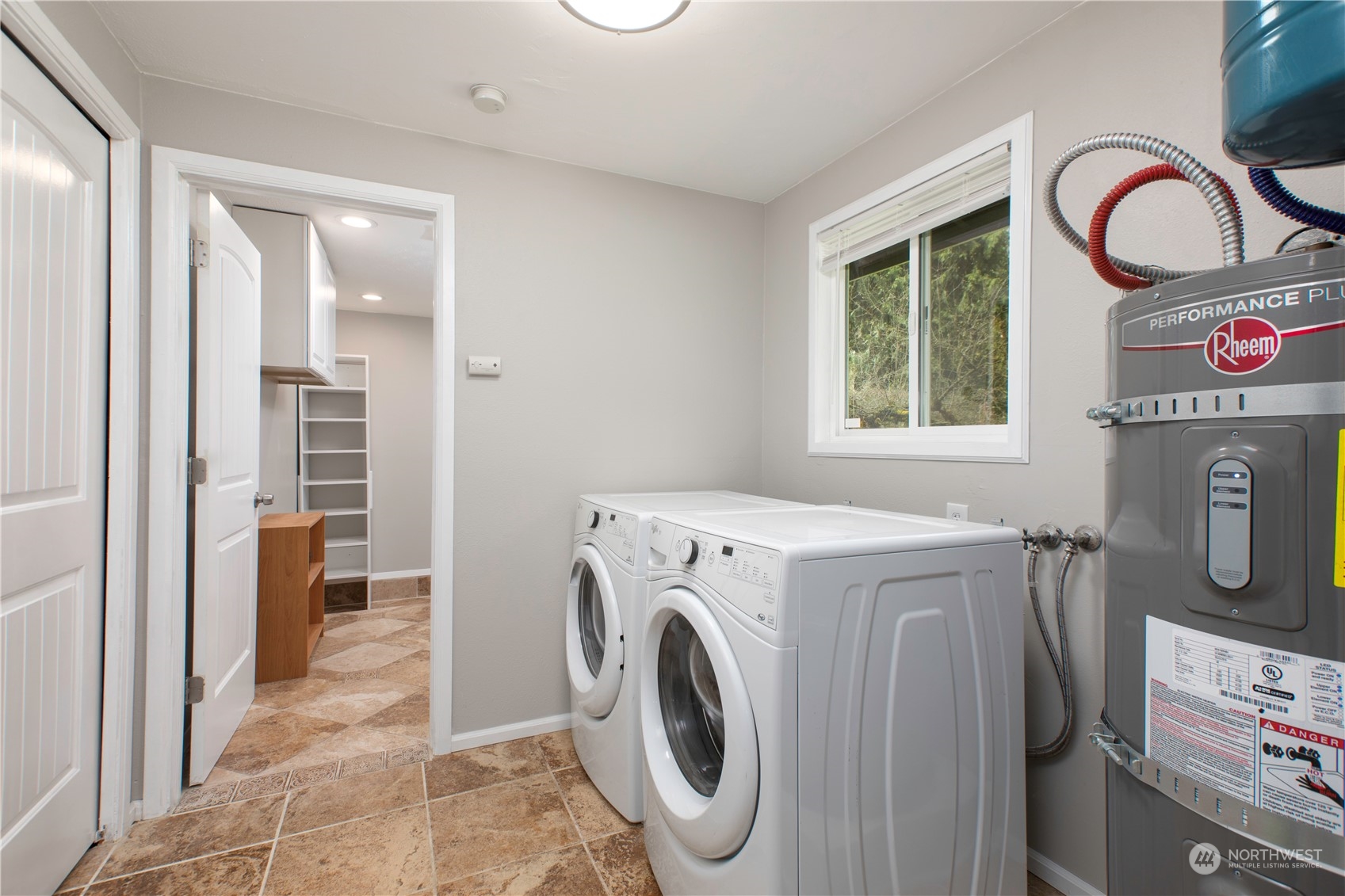 14092 Southeast 190th Street Renton, WA 98058 - Photo 14 of 27 a utility room with dryer and washer