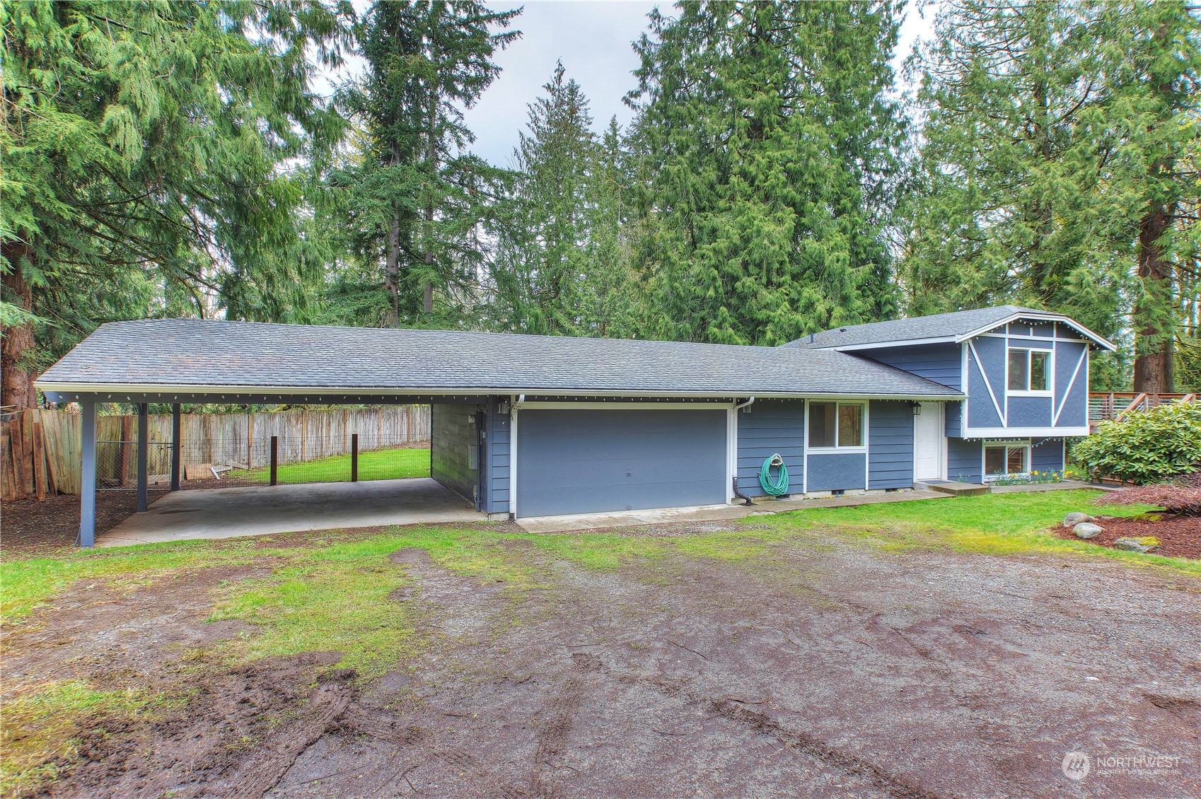 14092 Southeast 190th Street Renton, WA 98058 - Photo 2 of 27 a front view of a house with a yard and trees