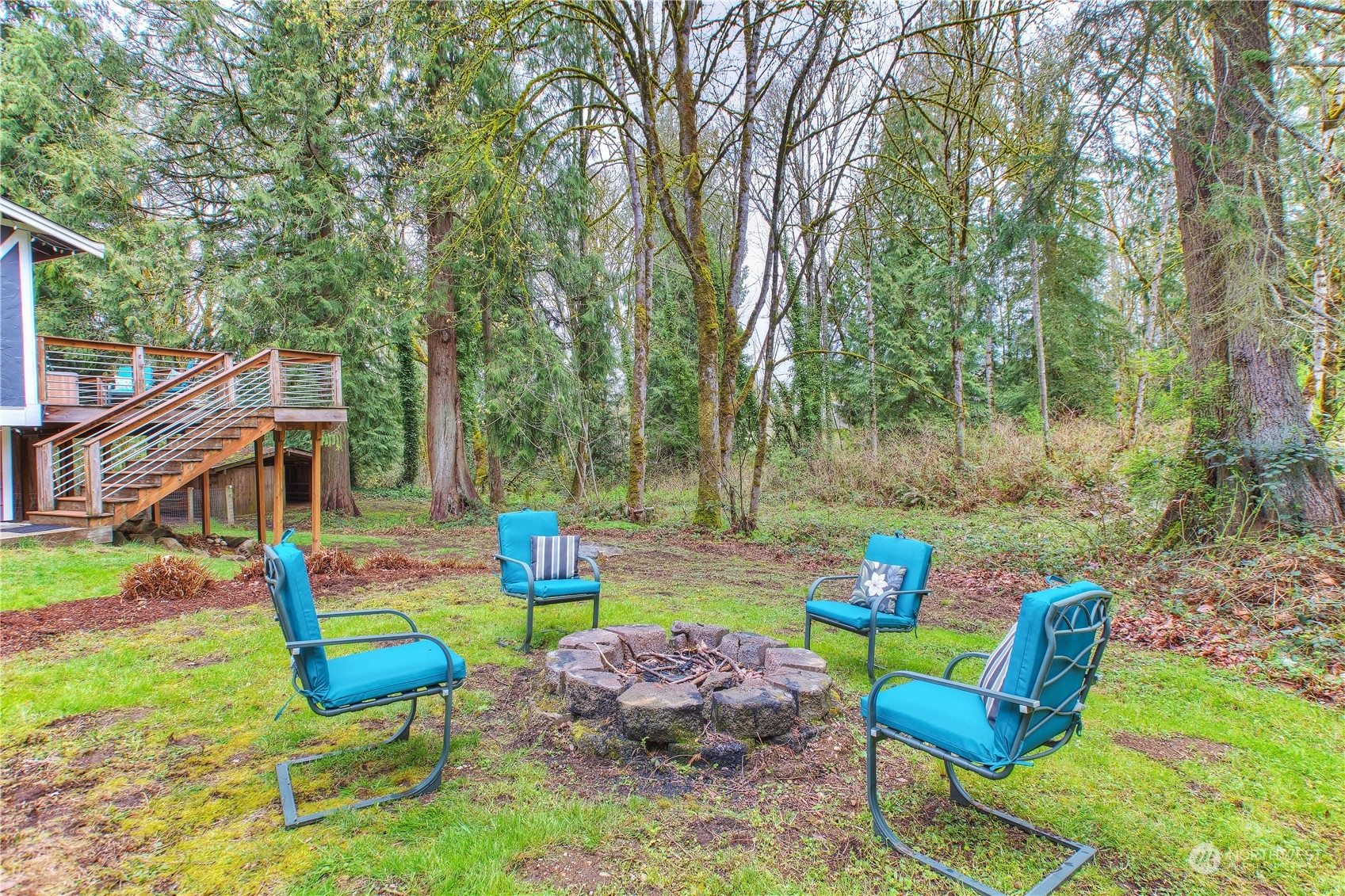 14092 Southeast 190th Street Renton, WA 98058 - Photo 25 of 27 a view of backyard with seating space and trees