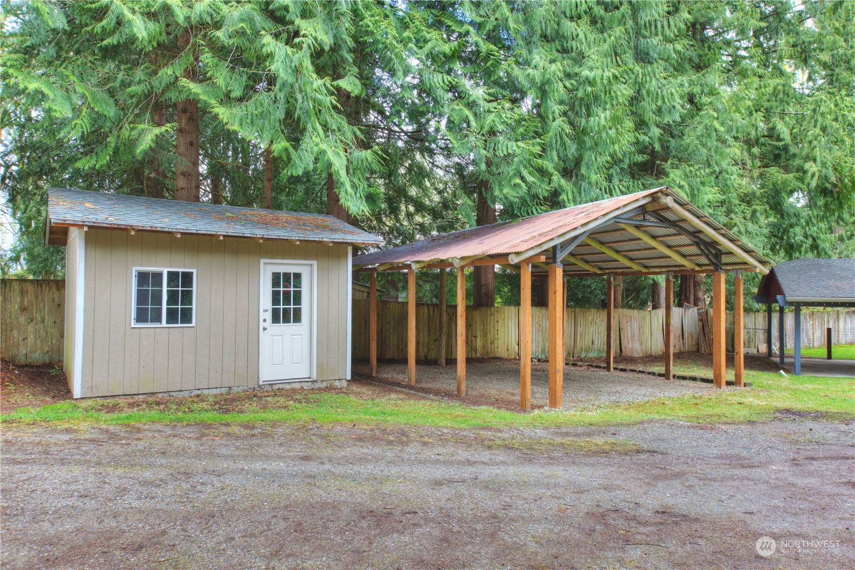 14092 Southeast 190th Street Renton, WA 98058 - Photo 26 of 27 a front view of a house with a garden