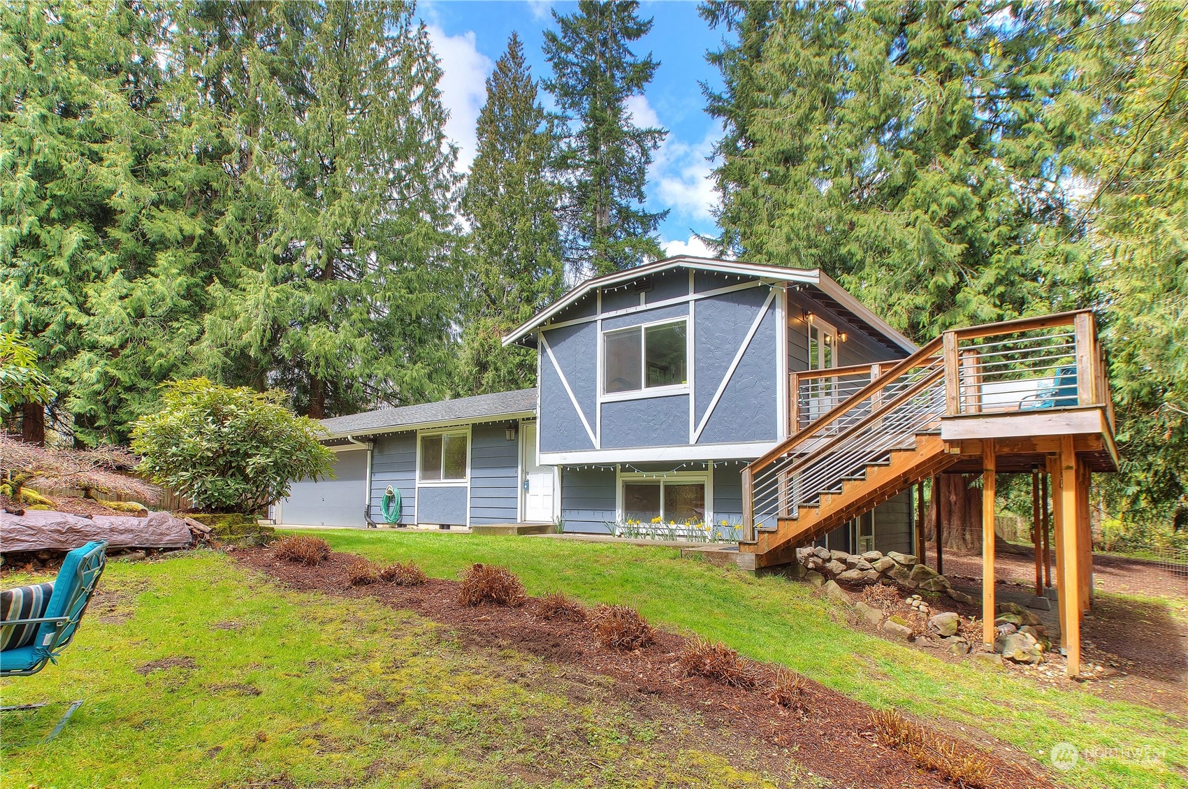 14092 Southeast 190th Street Renton, WA 98058 - Photo 3 of 27 a front view of a house with a yard