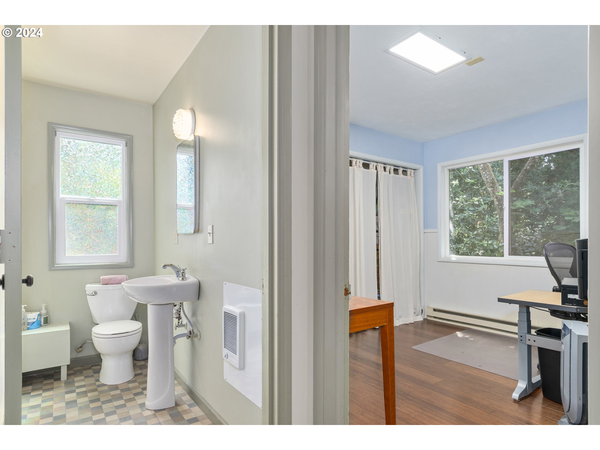 369 West D Street Springfield, OR 97477 - Photo 20 of 48 a bathroom with a toilet a sink a mirror and a window
