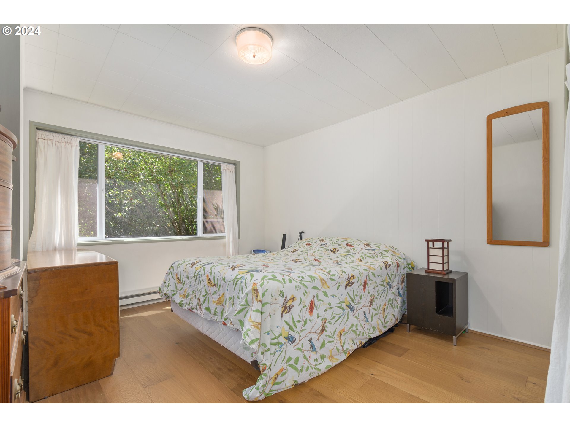 369 West D Street Springfield, OR 97477 - Photo 22 of 48 a bedroom with a bed and window