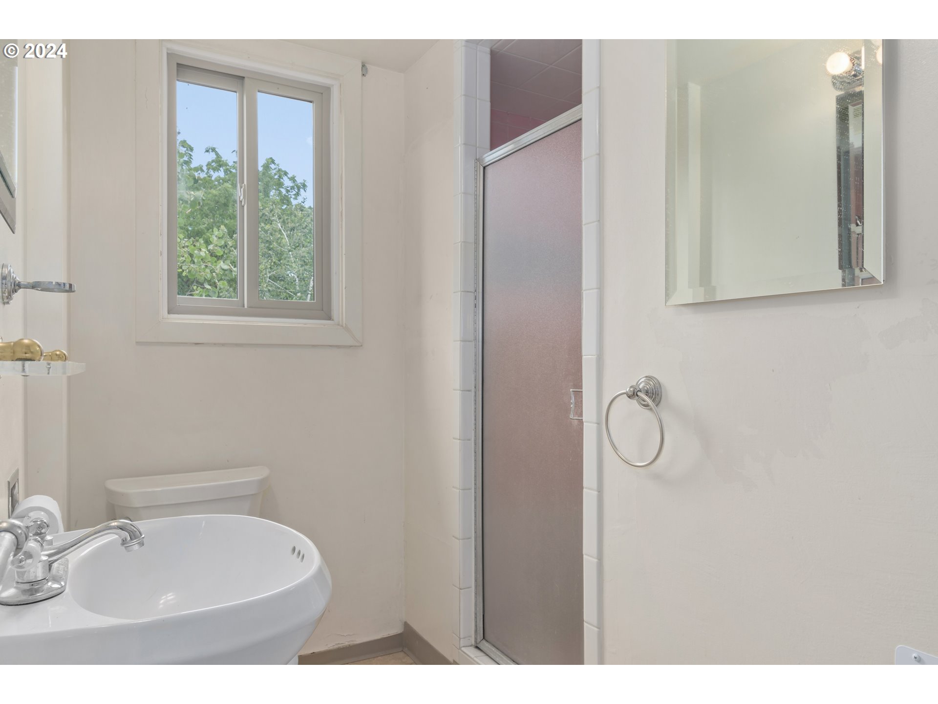 369 West D Street Springfield, OR 97477 - Photo 39 of 48 a bathroom with a sink and a mirror