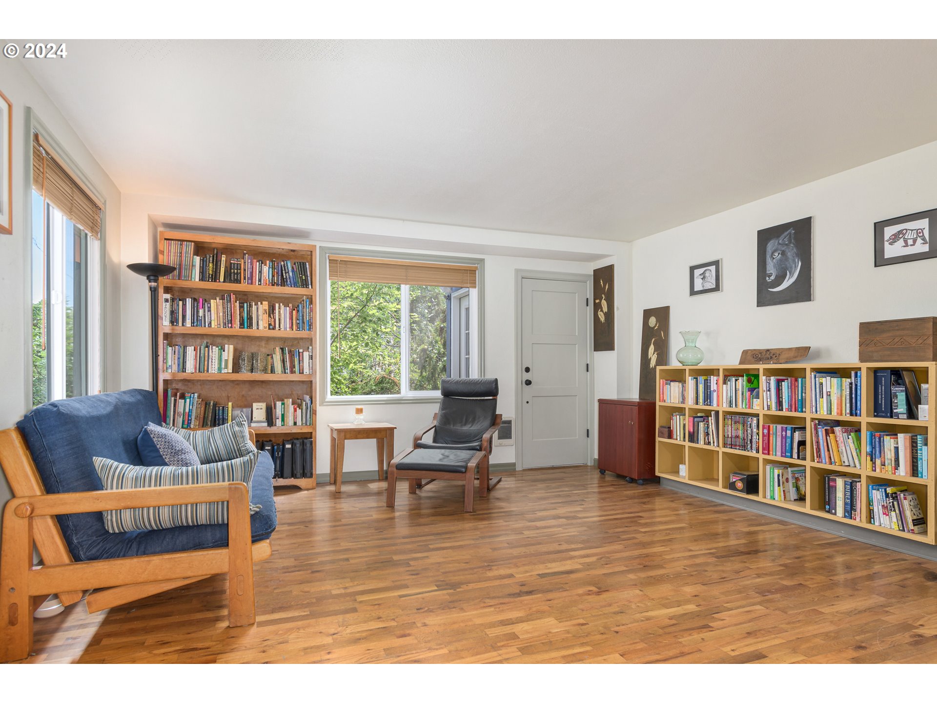 369 West D Street Springfield, OR 97477 - Photo 8 of 48 a living room with furniture and a book shelf