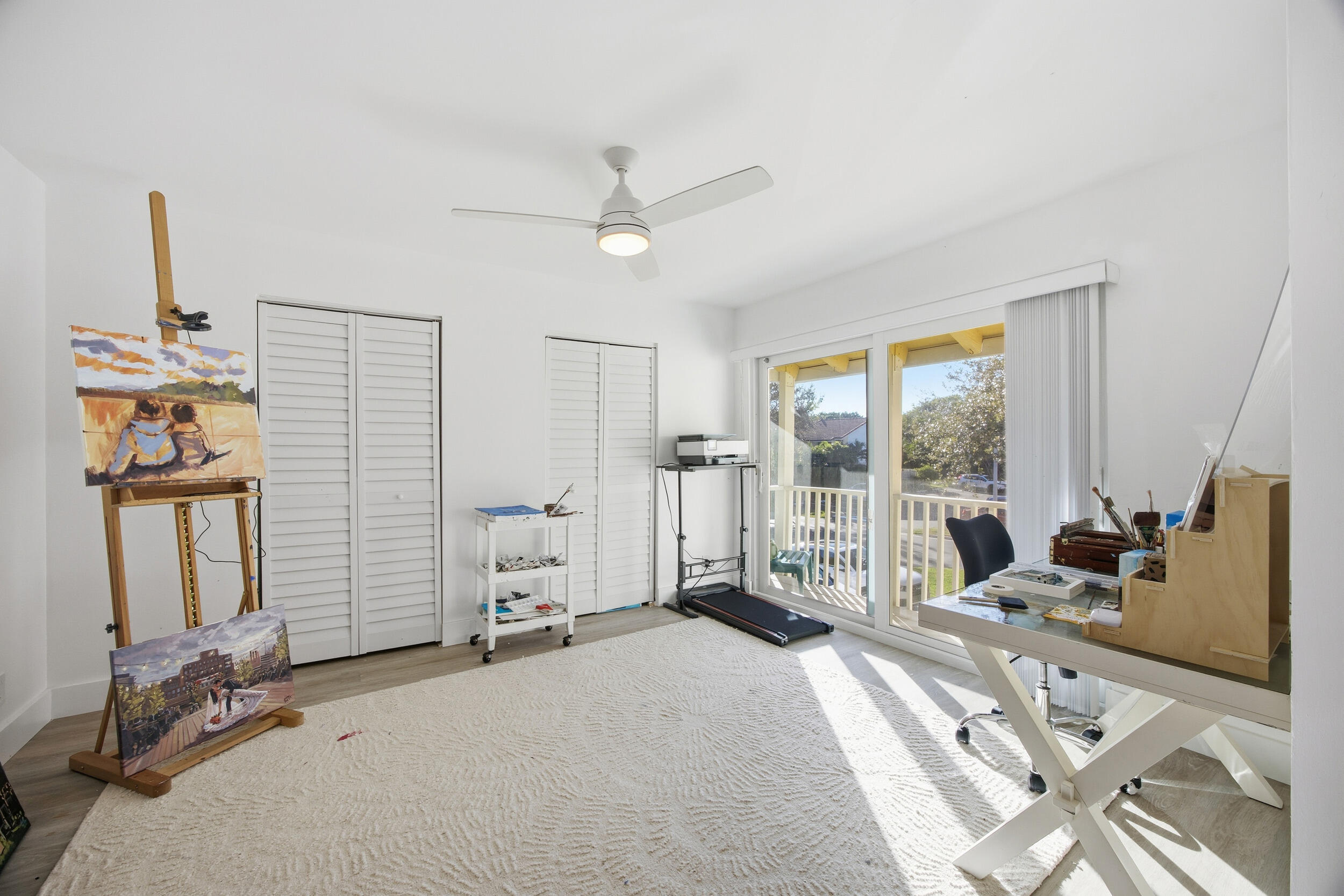 153 Seabreeze Circle Jupiter, FL 33477 - Photo 23 of 36 a very nice looking room with a large window and a bed