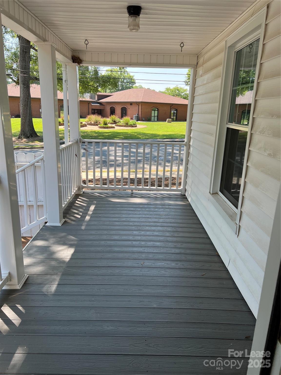 a view of a balcony with an outdoor space