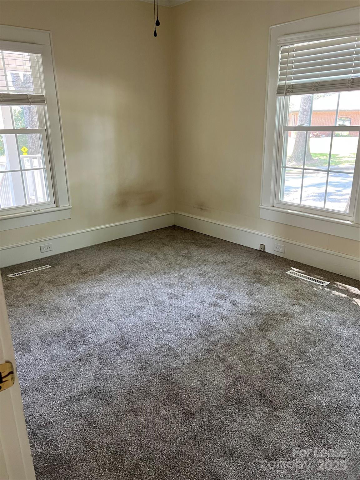 201 Goldston Street Kannapolis, NC 28081 - Photo 8 of 12 an empty room with a window