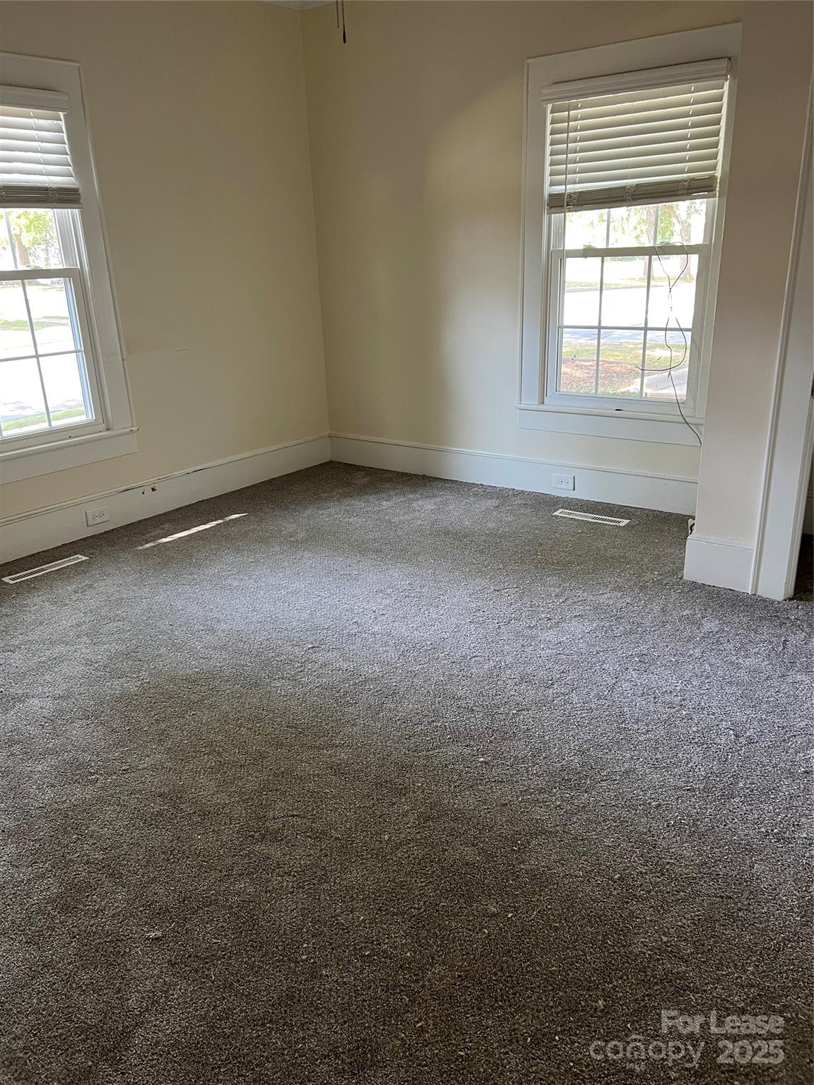 201 Goldston Street Kannapolis, NC 28081 - Photo 10 of 12 an empty room with a window