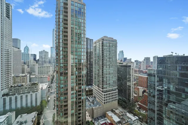 a view of a city with tall buildings