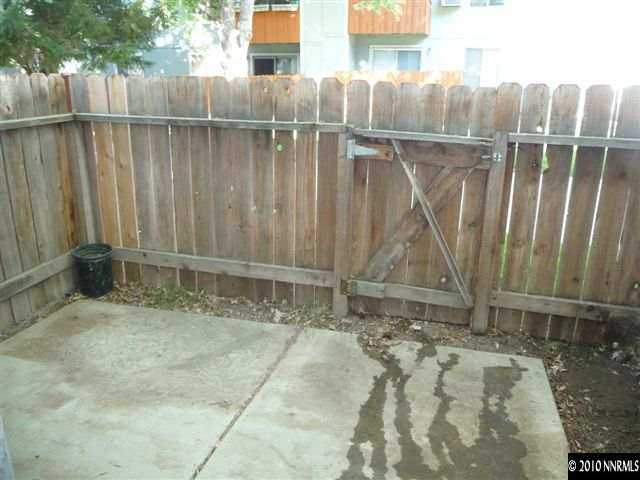 4606 Neil Road, Unit 187 Reno, NV 89502 - Photo 7 of 7 a view of outdoor space with wooden fence