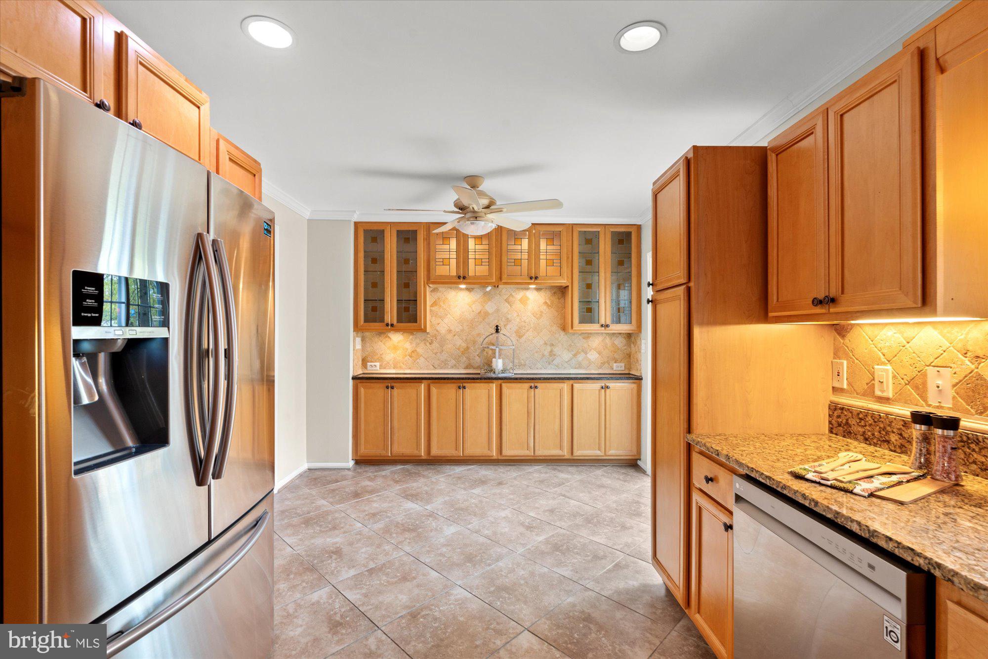 6 West Glebe Road Alexandria, VA 22305 - Photo 14 of 45 a kitchen with stainless steel appliances granite countertop a refrigerator a stove and a sink