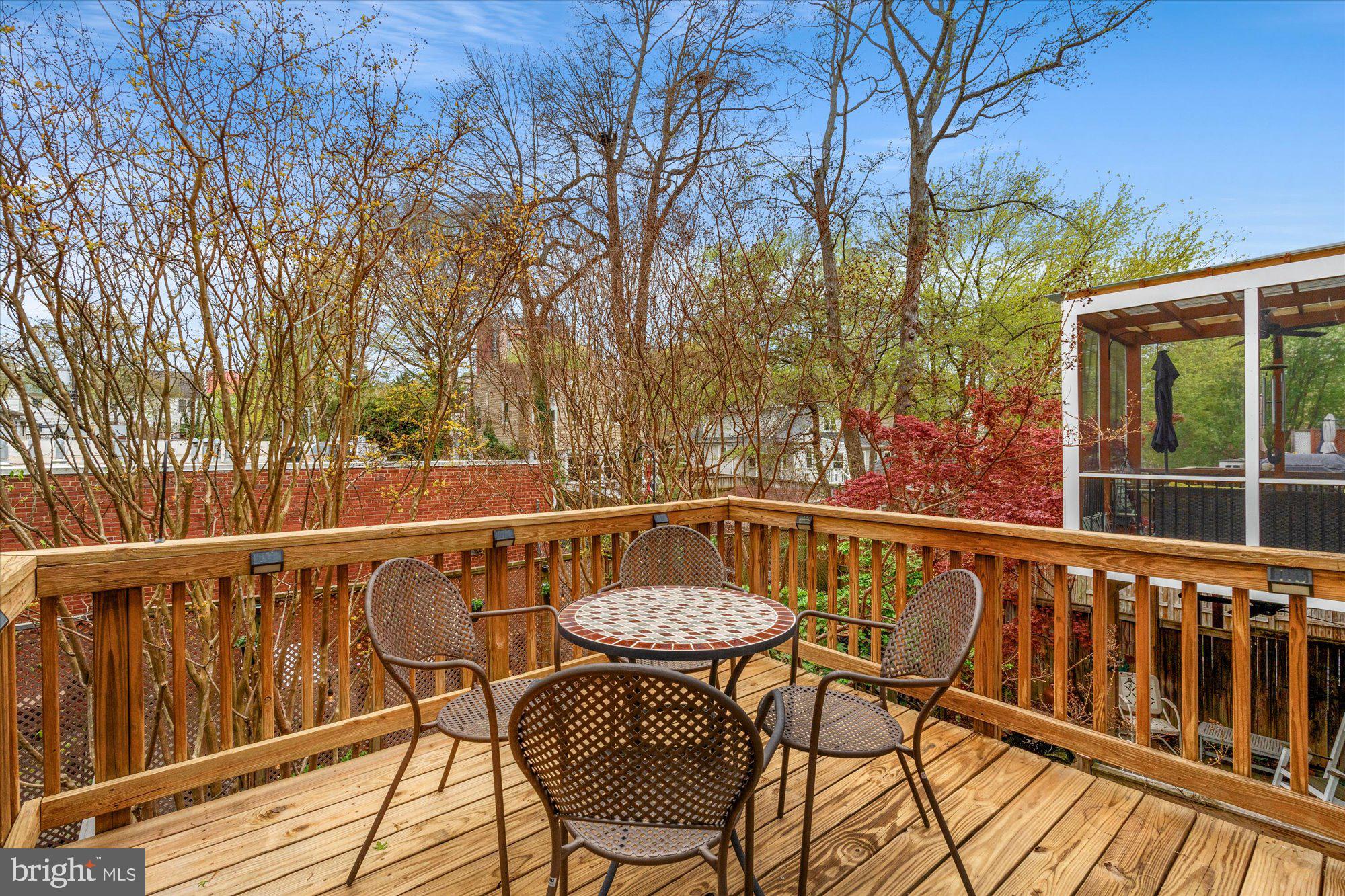 6 West Glebe Road Alexandria, VA 22305 - Photo 18 of 45 a view of a chairs and table on the deck