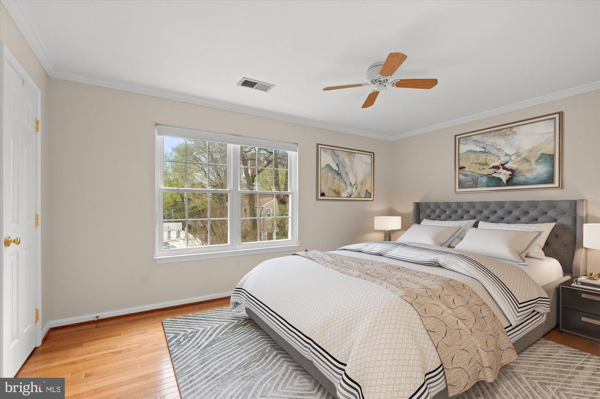 6 West Glebe Road Alexandria, VA 22305 - Photo 30 of 45 a bedroom with a large bed and a window