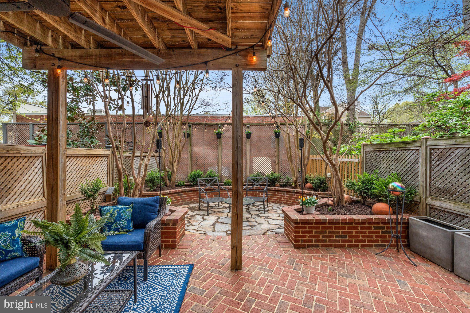 6 West Glebe Road Alexandria, VA 22305 - Photo 36 of 45 a building outdoor space with patio furniture and potted plants