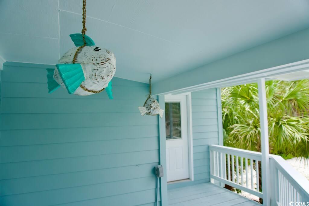 4702 South Ocean Boulevard Surfside Beach, SC 29575 - Photo 28 of 39 View of wooden terrace