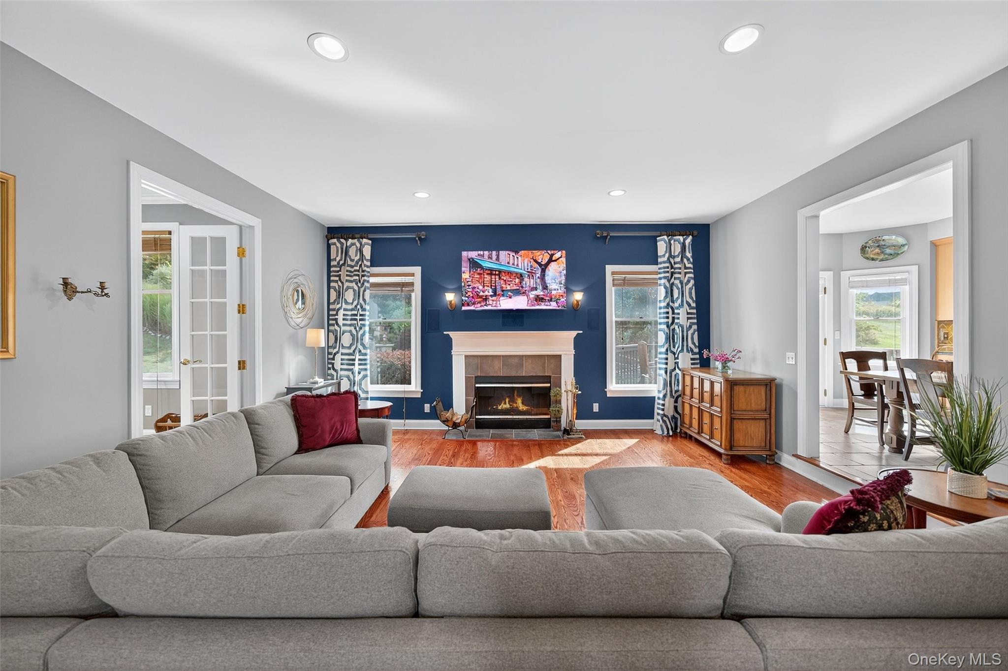 11 Dorian Way Campbell Hall, NY 10916 - Photo 12 of 40 a living room with furniture large window and fireplace