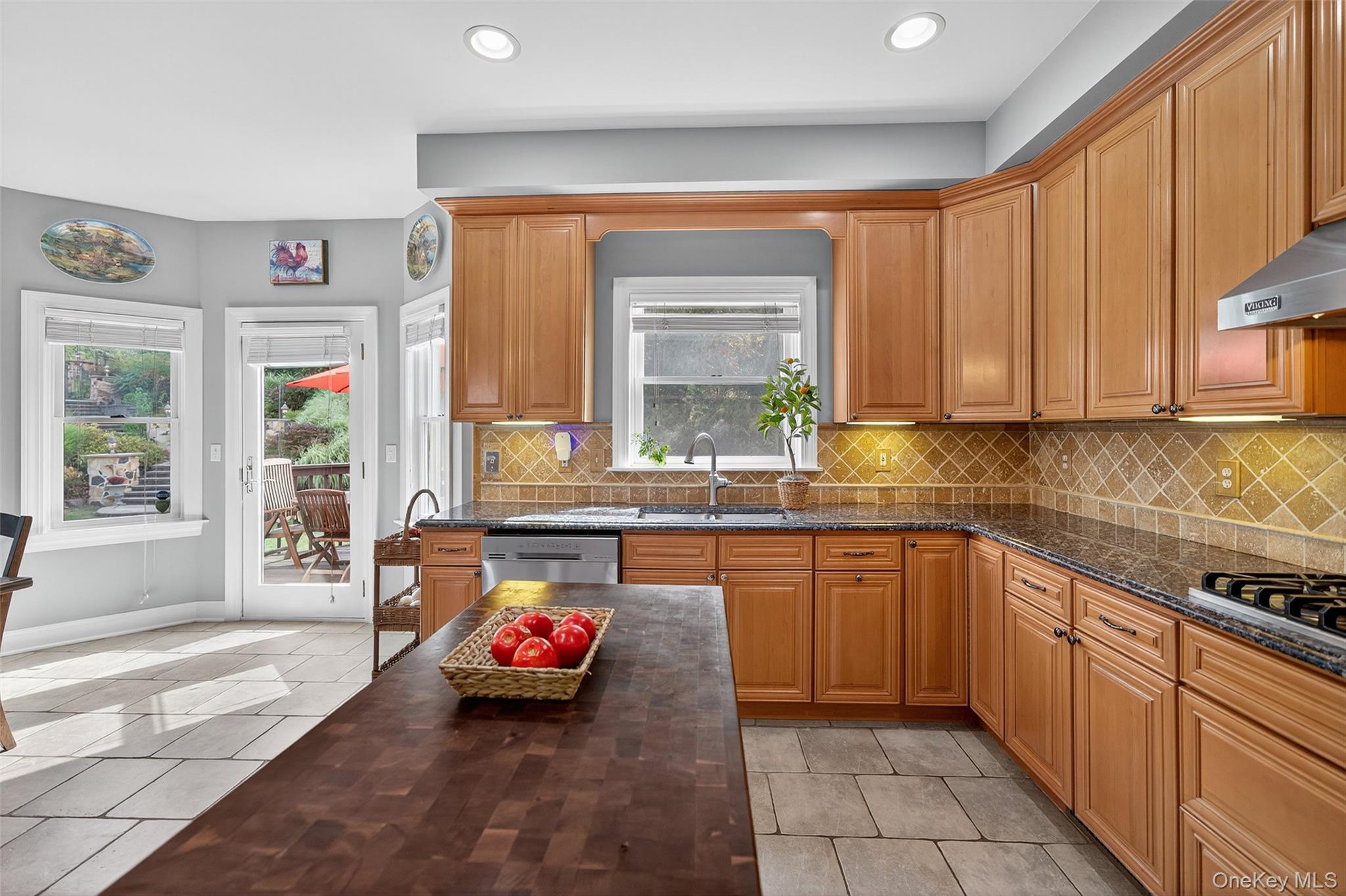 11 Dorian Way Campbell Hall, NY 10916 - Photo 17 of 40 a kitchen with stainless steel appliances kitchen island granite countertop a sink dishwasher stove and cabinets