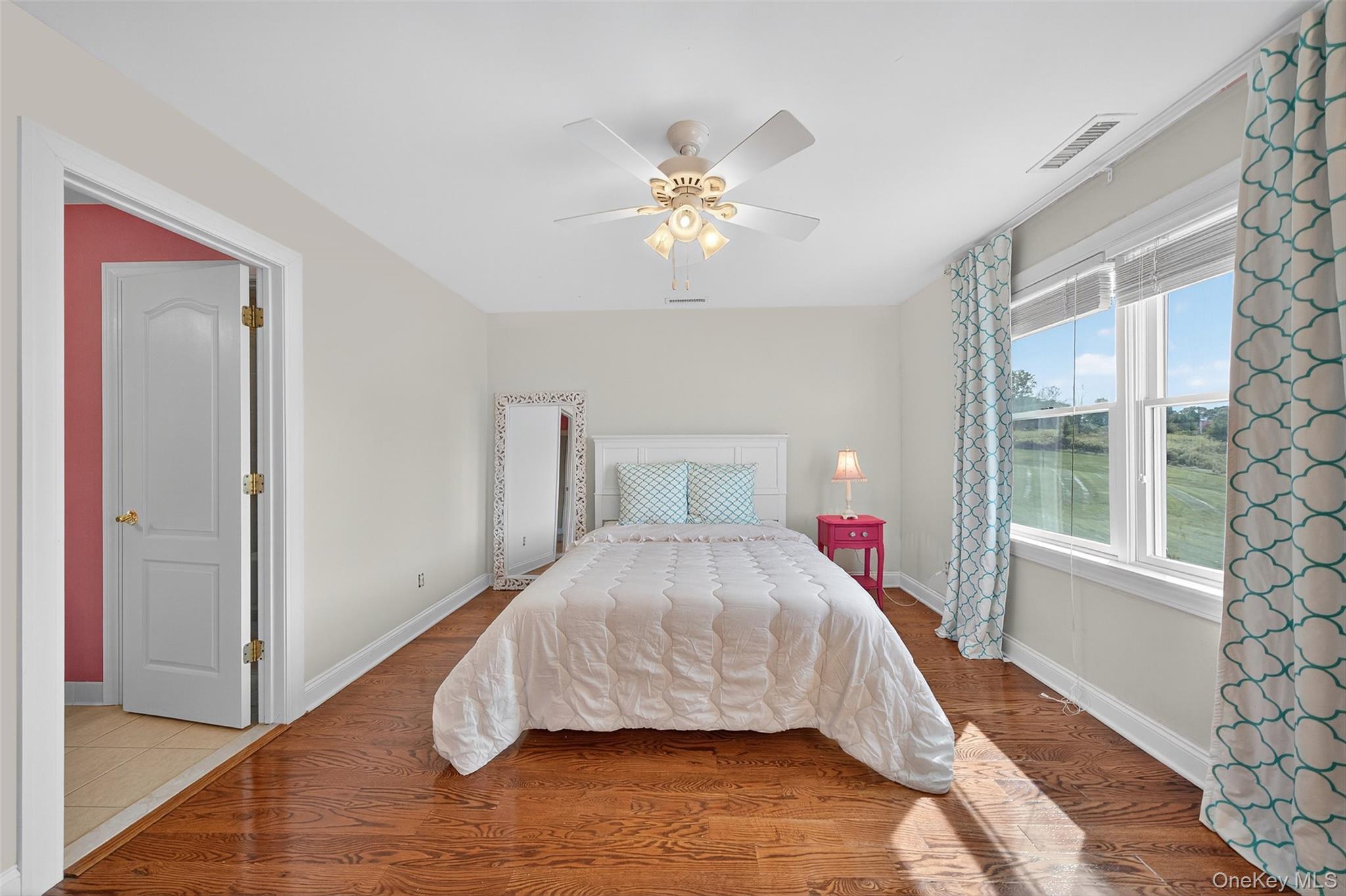 11 Dorian Way Campbell Hall, NY 10916 - Photo 26 of 40 a bedroom with a bed and a window