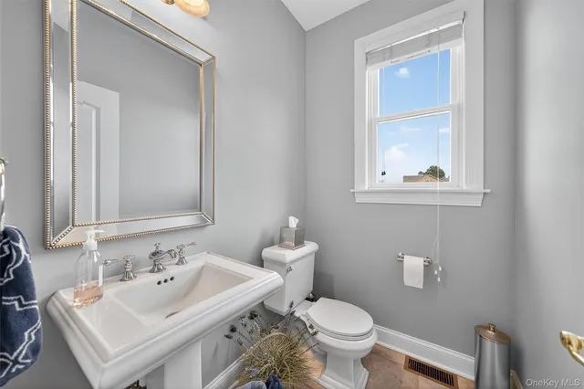 a bathroom with a sink and a toilet