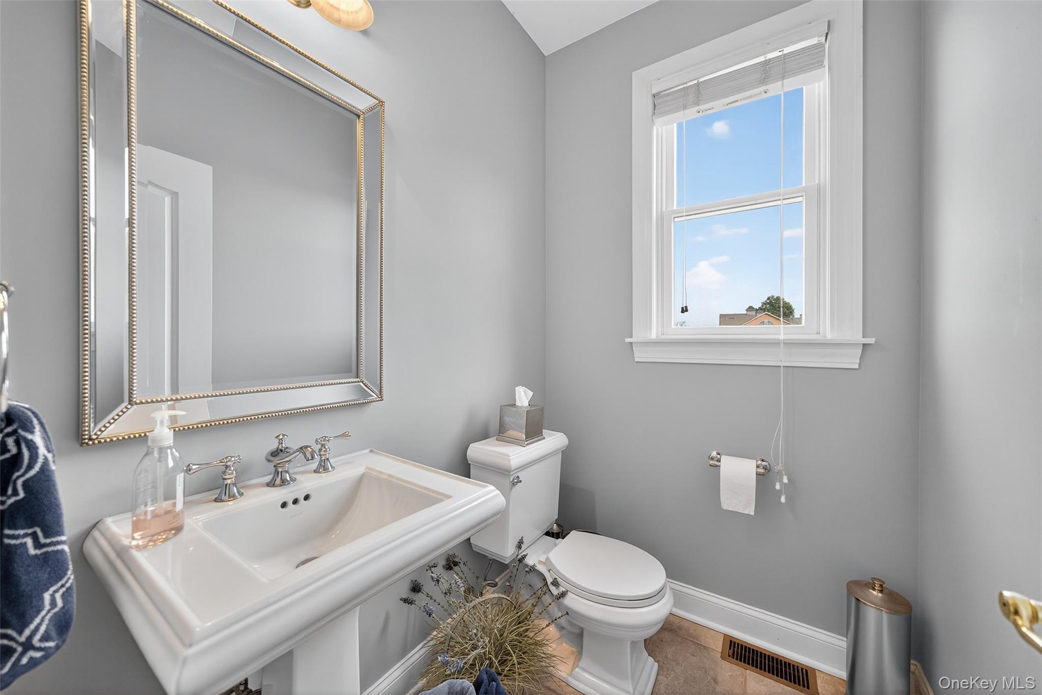 11 Dorian Way Campbell Hall, NY 10916 - Photo 8 of 40 a bathroom with a sink and a toilet