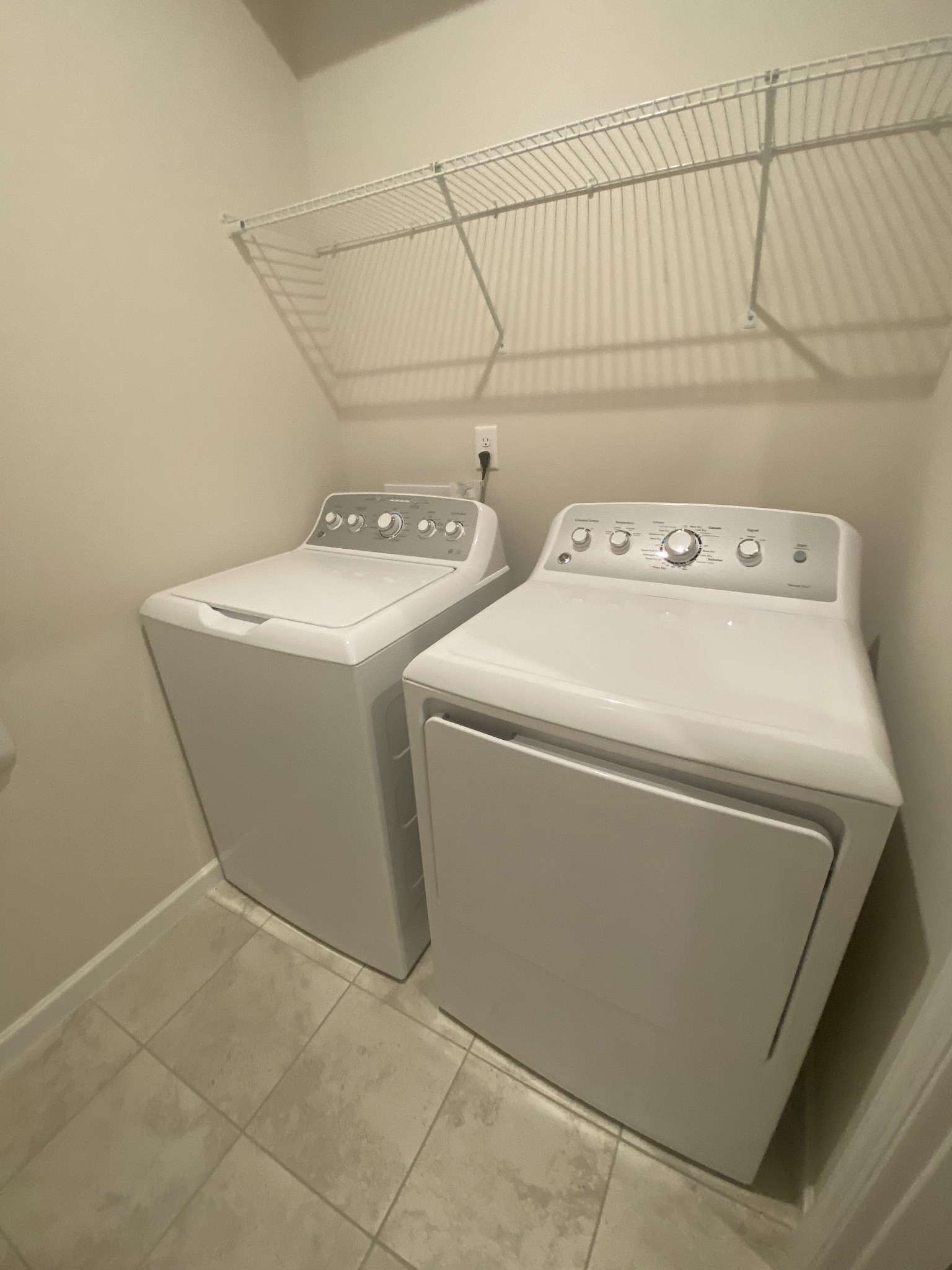107 Keelon Gap Road, Unit 180A Spring Hill, TN 37174 - Photo 7 of 16 a utility room with dryer and washer
