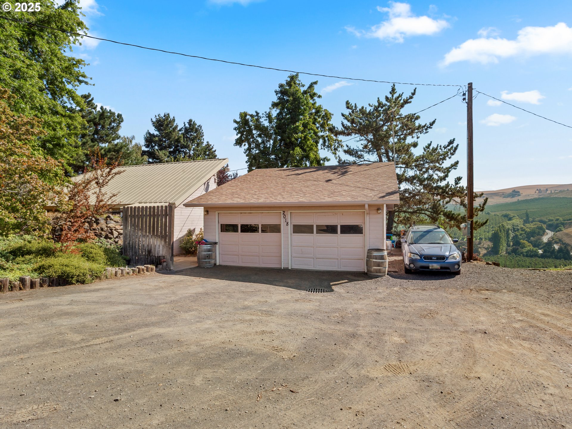 2018 Steele Road The Dalles, OR 97058 - Photo 11 of 36 a view of a house with a yard