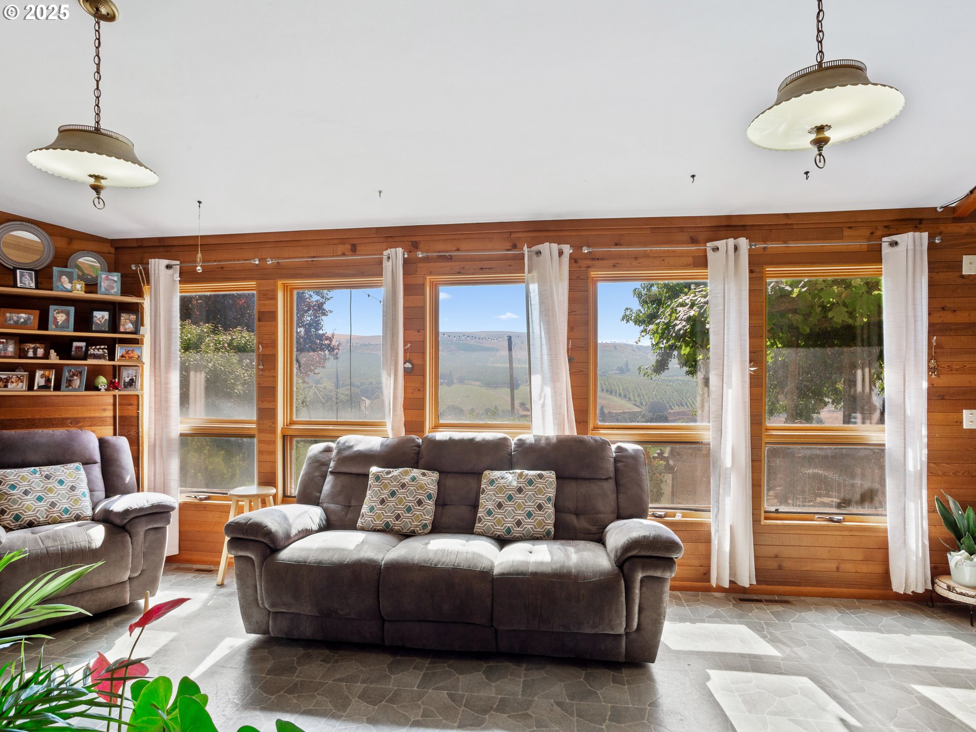 2018 Steele Road The Dalles, OR 97058 - Photo 15 of 36 a living room with furniture and a large window