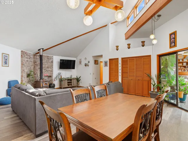 a view of a dining room with furniture window and outside view