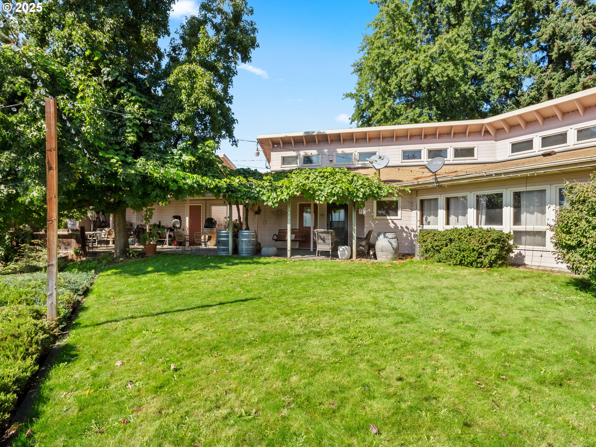 2018 Steele Road The Dalles, OR 97058 - Photo 26 of 36 a front view of a house with a garden