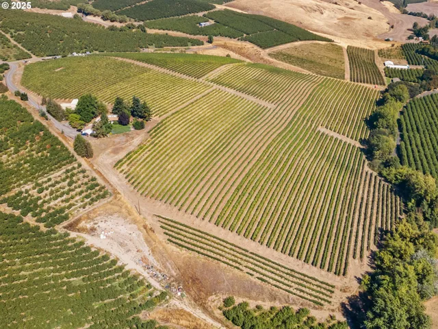 a view of a swimming pool with an outdoor space and seating area