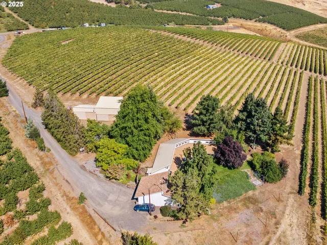 a view of a lake with a floor to ceiling window