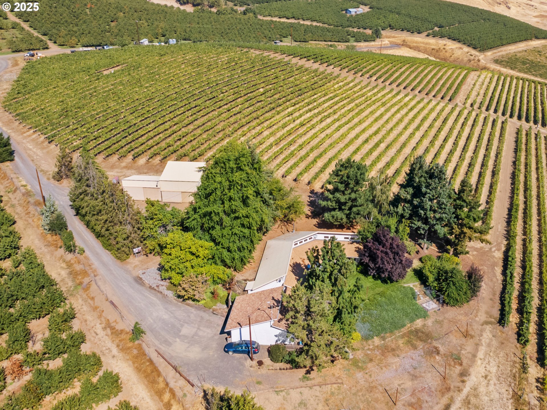 2018 Steele Road The Dalles, OR 97058 - Photo 10 of 36 a view of a lake with a floor to ceiling window