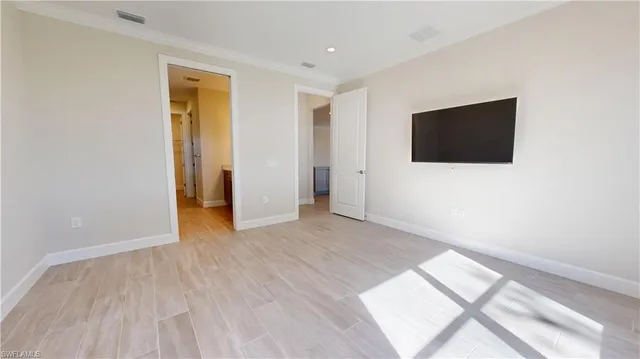 a bathroom with a double vanity sink and mirror with shower