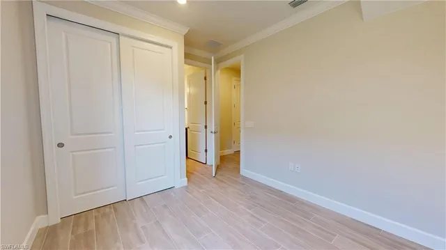 a bathroom with a granite countertop sink toilet a mirror and shower