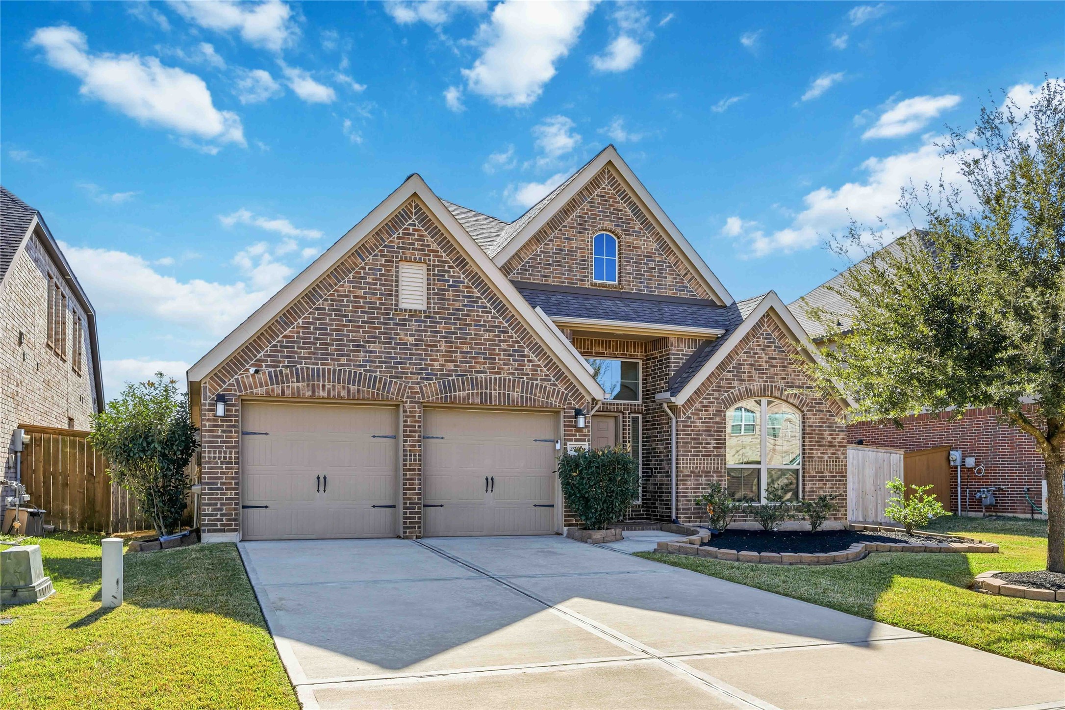 2726 Cutter Court Manvel, TX 77578 - Photo 2 of 44 a front view of a house with a yard