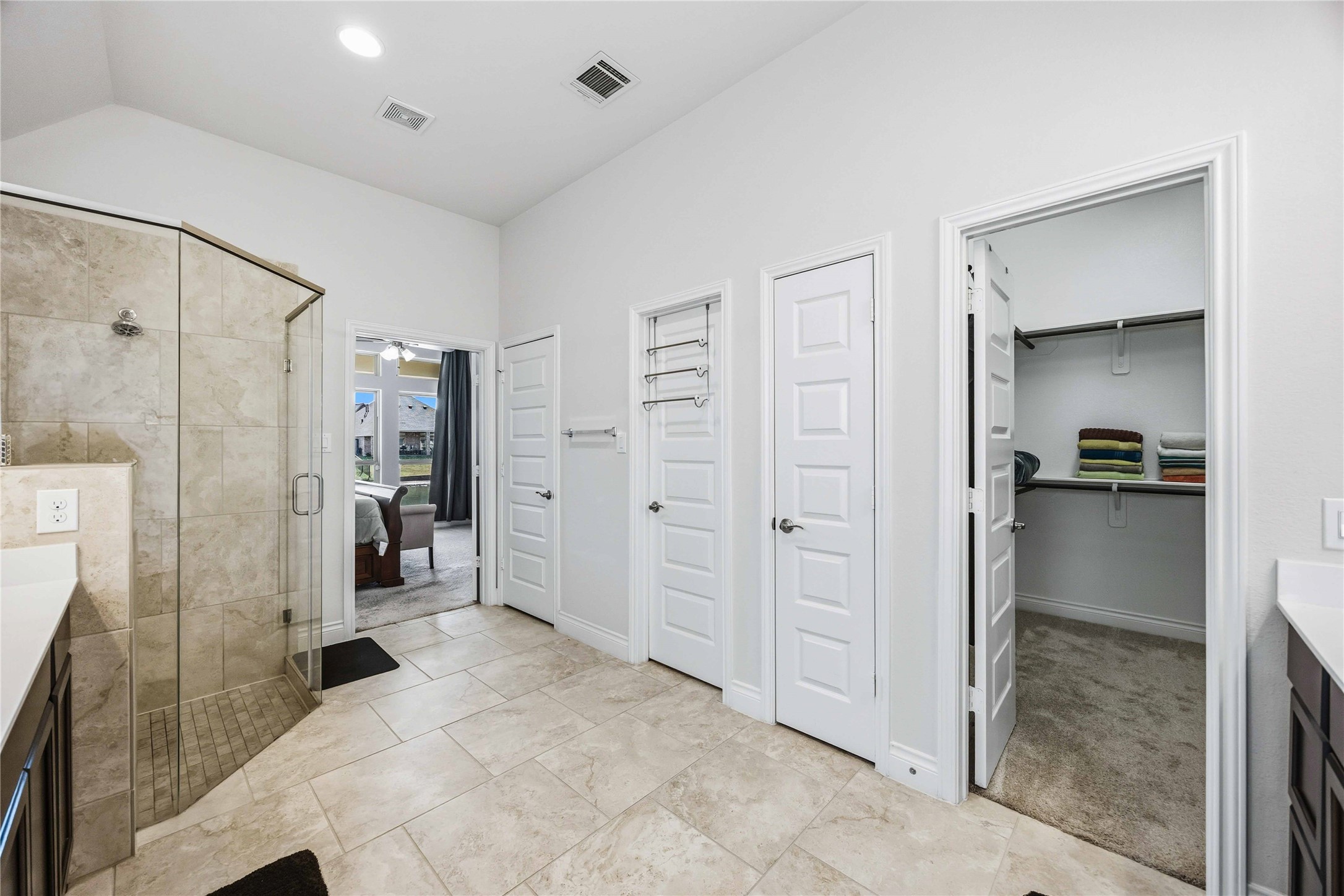 2726 Cutter Court Manvel, TX 77578 - Photo 30 of 44 a view of a bathroom with a shower and closet