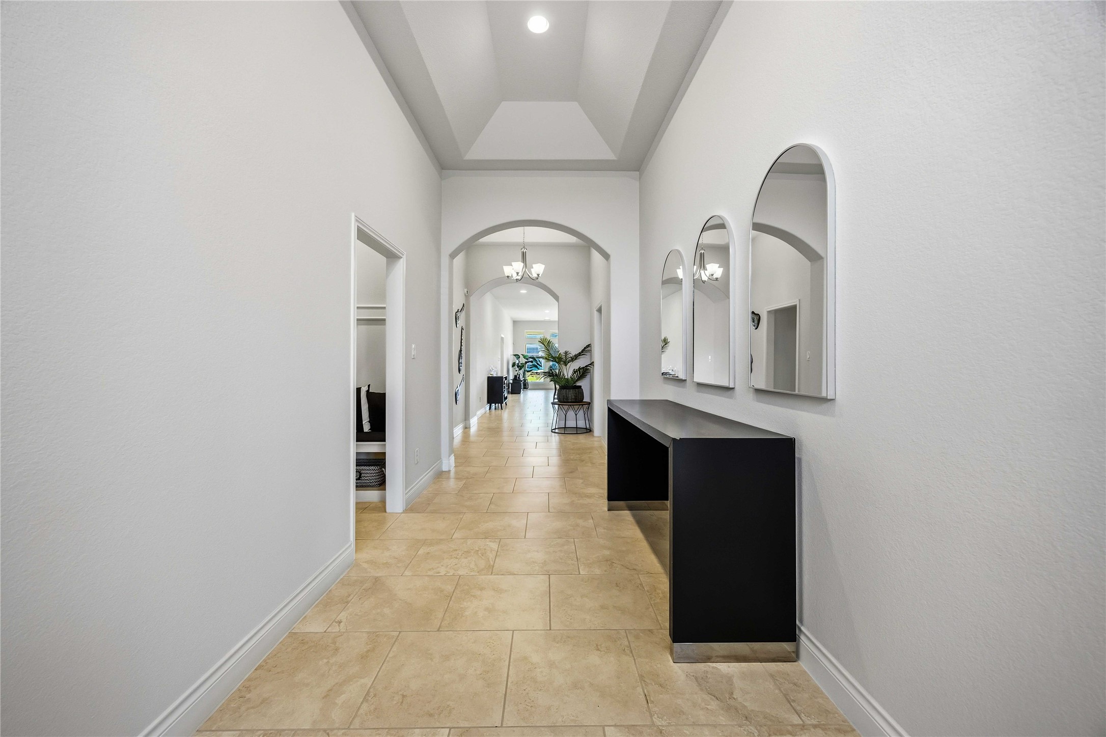 2726 Cutter Court Manvel, TX 77578 - Photo 7 of 44 a view of entryway and hall with wooden floor