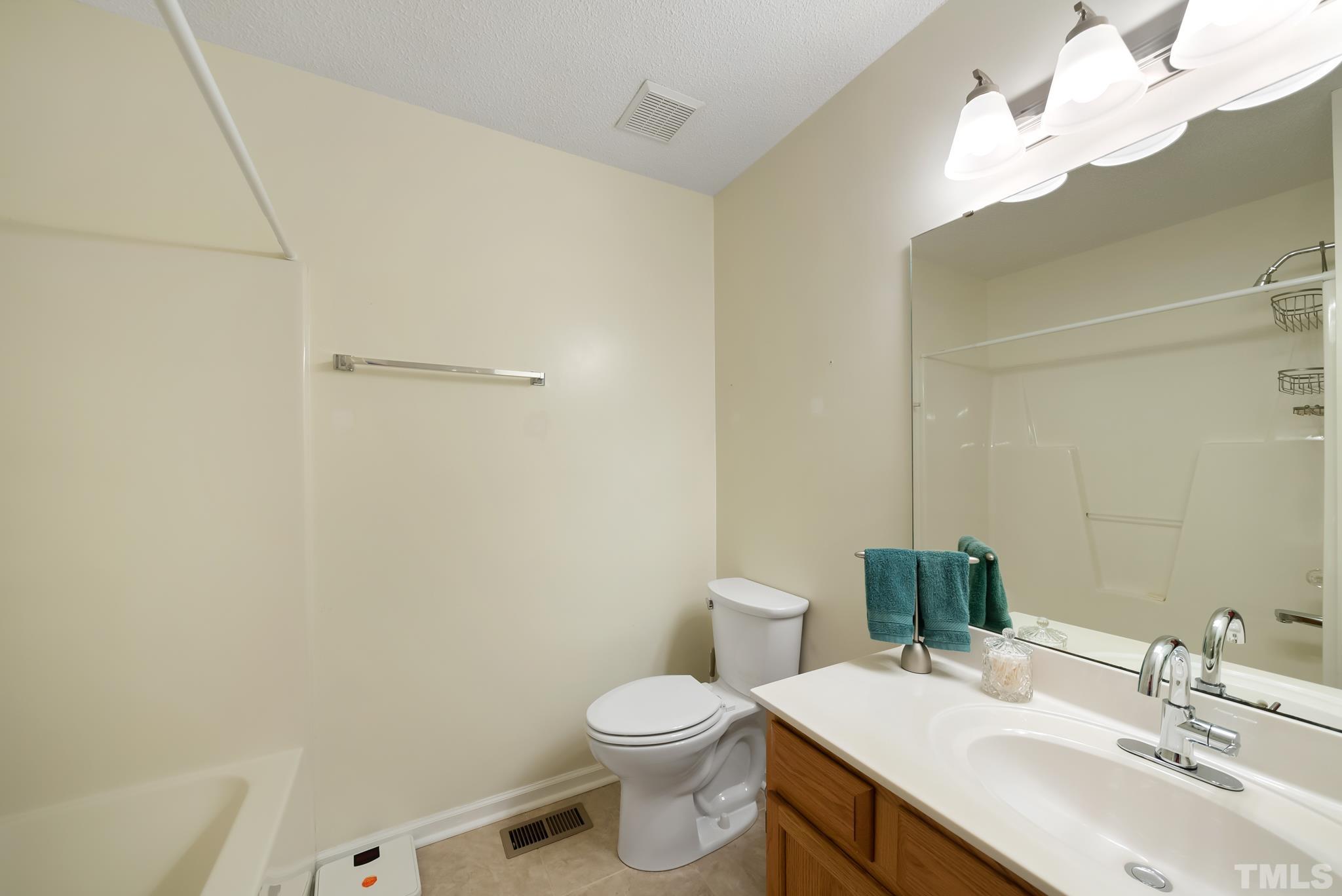 3500 Milky Way Raleigh, NC 27604 - Photo 16 of 30 a bathroom with a sink a toilet and vanity