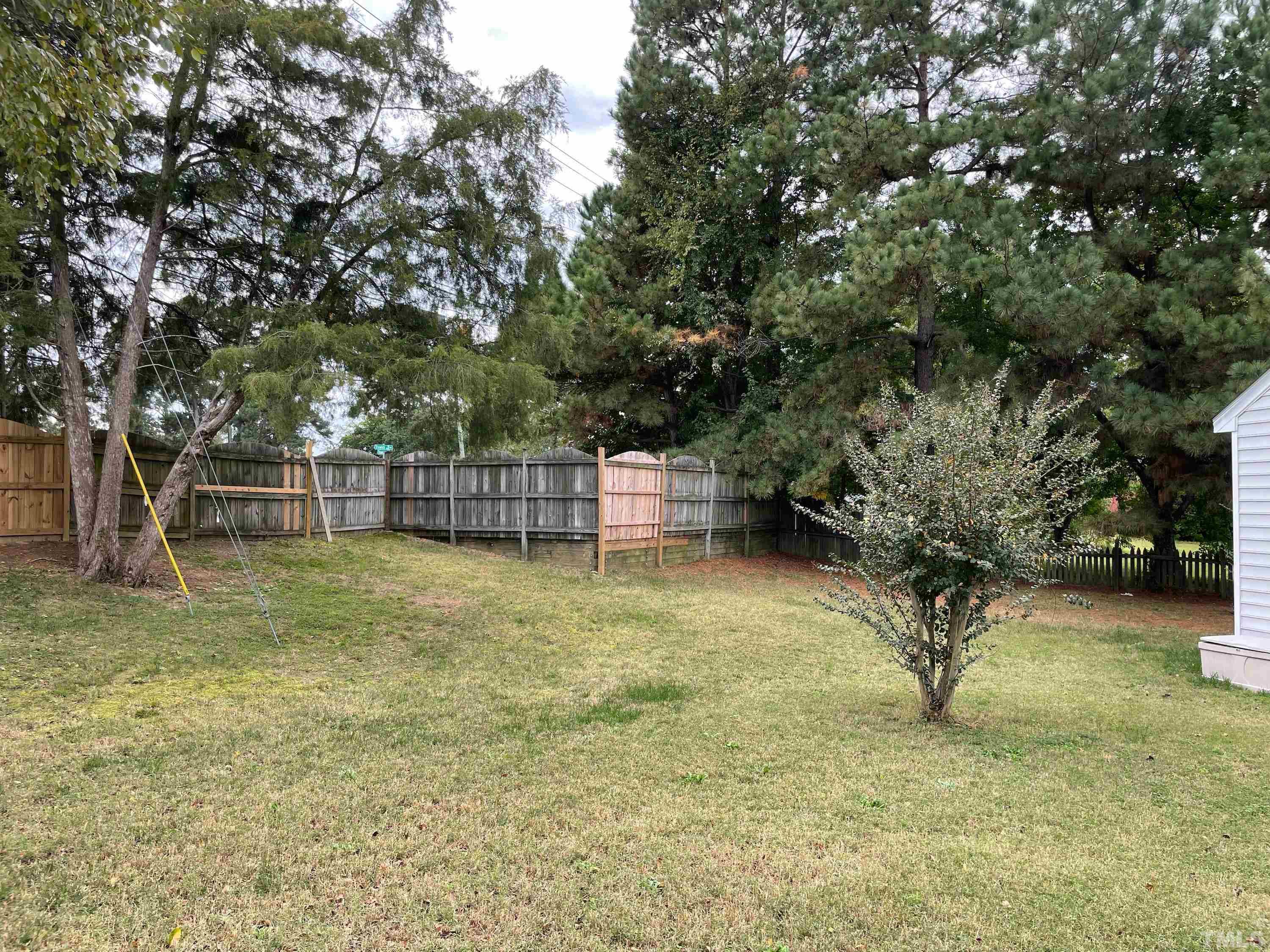 3500 Milky Way Raleigh, NC 27604 - Photo 4 of 30 a view of a yard with a tree