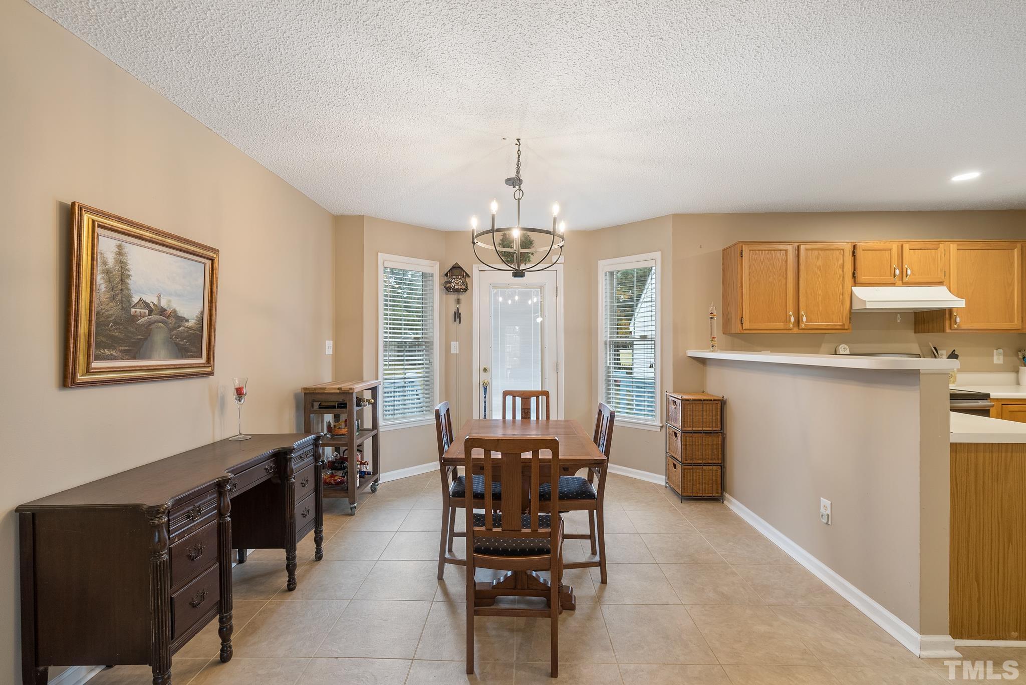 3500 Milky Way Raleigh, NC 27604 - Photo 6 of 30 a dining room with furniture and window