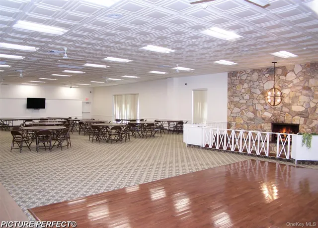 a view of a living room and dining room