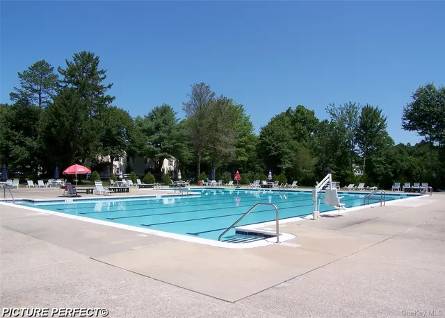 a view of a park with swings and slides