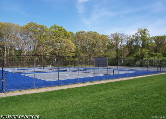 a view of a lake with a big yard